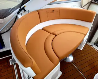 Custom marine cushions installed on a boat deck