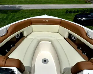 Custom boat seating reupholstered in tan marine vinyl