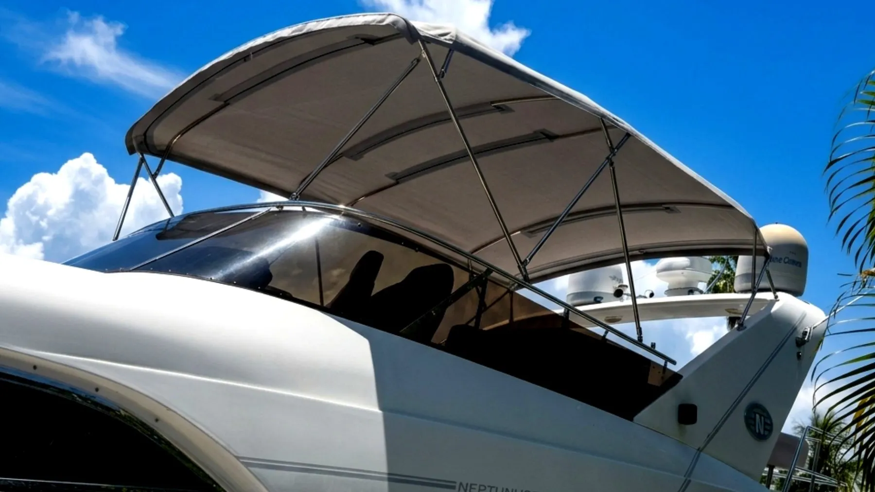 Custom bimini top installed on a boat by Villegas Brothers Marine Upholstery